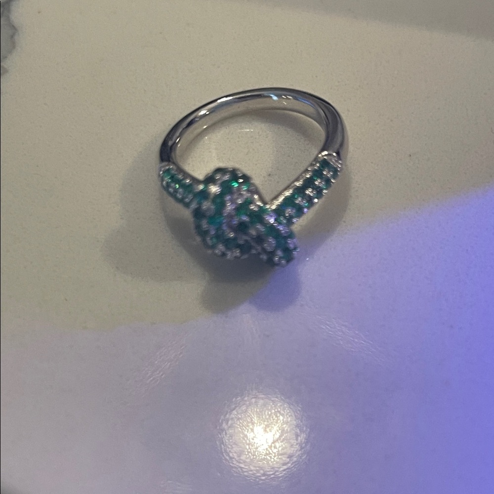 Sterling Silver Knot Ring with Green Cubic Zirconia Accents